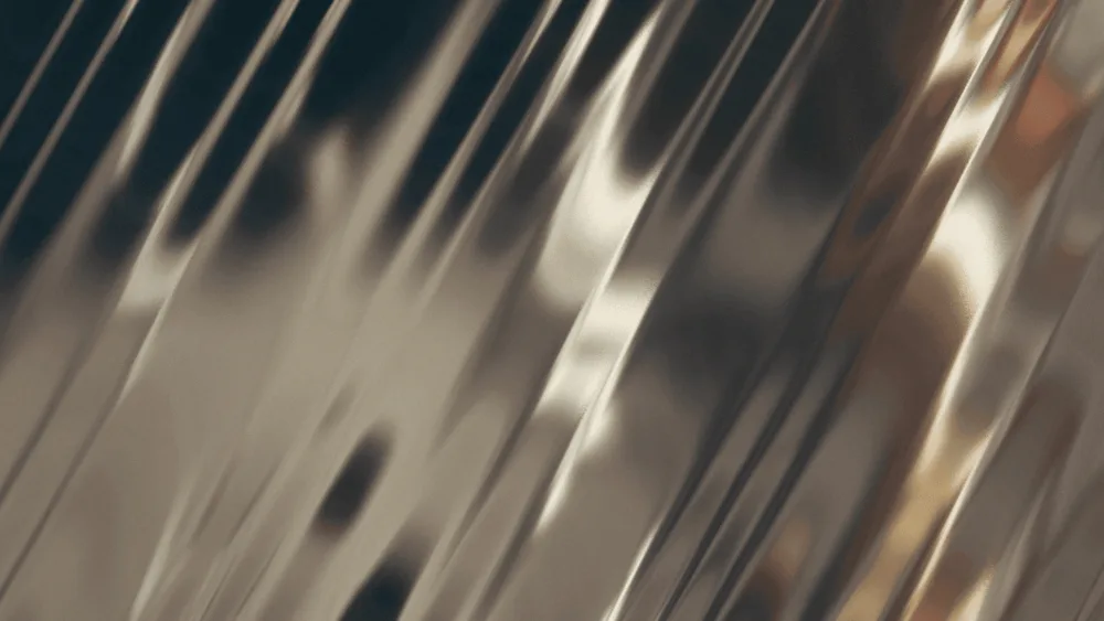 Blurred charcoal and cream abstract streaks